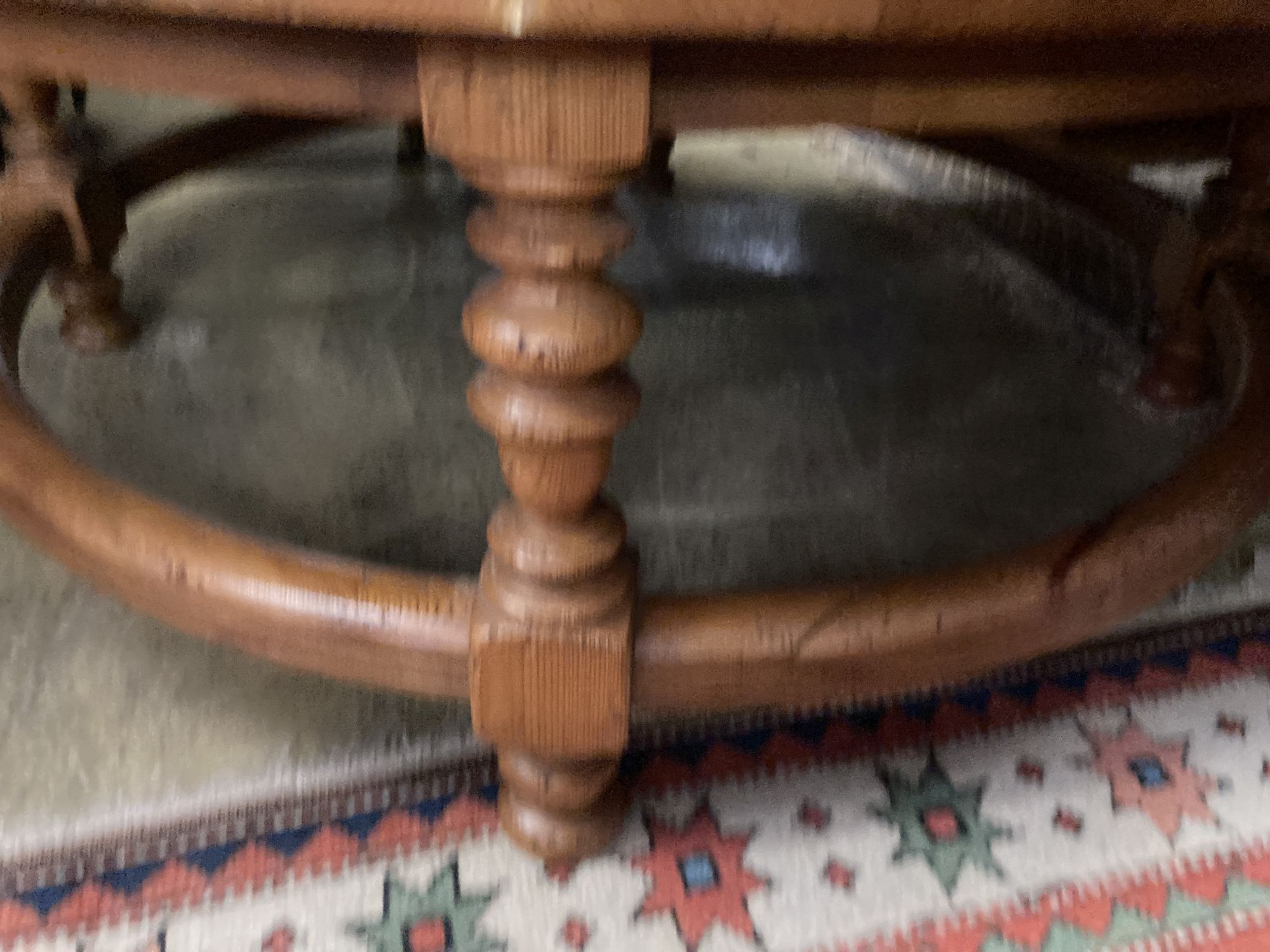 A circular pine low table inset two-handled brass brazier, diameter 108cm height 43cm